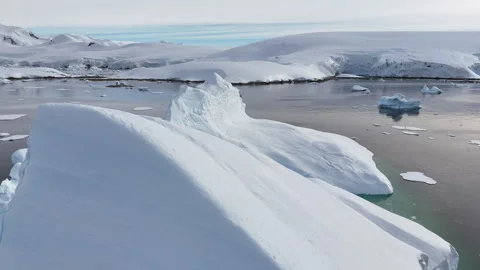 Aerial view of a massive iceberg floating in antarctica Stock Footage 320564270