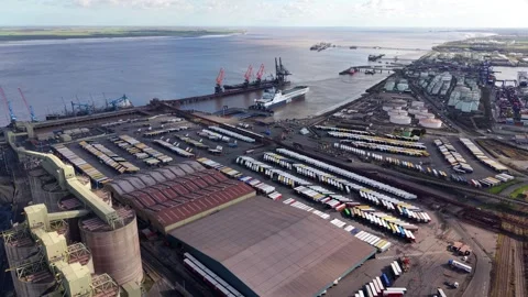 Aerial view of the massive industrial infrastructure and shipping docks at the Stock-Footage 339051438