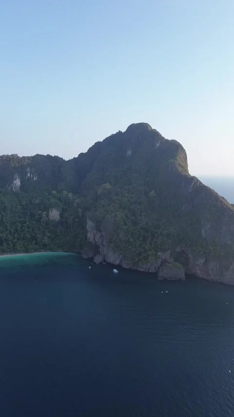 Aerial View of Massive Limestone Cliffs and Deep Blue Sea, Phi Phi Stock Footage 344547689