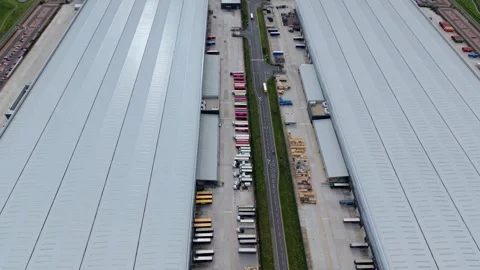 Aerial View of Massive Logistics Hub and Heavy HGV Freight Traffic in Appleby Stock Footage 343921119