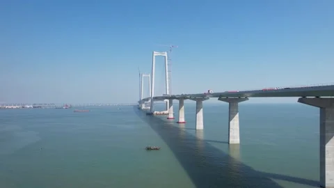 Aerial view of a massive modern cable stayed bridge over the open sea Video stock 342279939