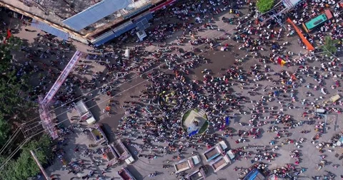 Aerial view of massive people celebrating during immersion of lord Ganesha Stock Footage 340084343