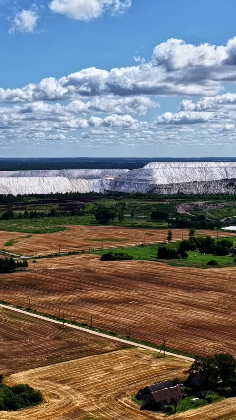 Aerial view of the massive phosphogypsum stacks from the Lifosa fertilizer Stock Footage 345483540