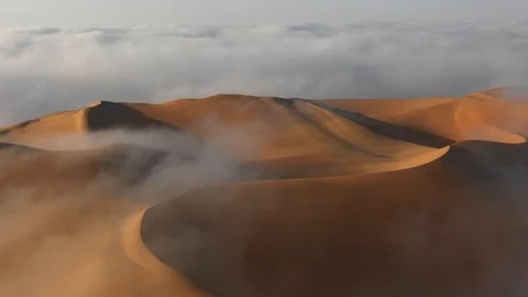 Aerial view of massive sand dunes in thick fog. Stock Footage 126282983