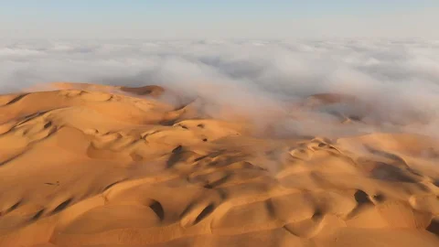 Aerial view of massive sand dunes in thick fog. Stock Footage 126283133