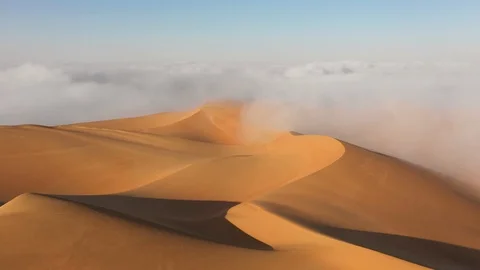 Aerial view of massive sand dunes in thick fog. Stock Footage 126283225
