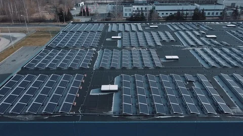 Aerial view of massive solar panel roof setup. Industrial scale green energy.  Stock Footage 125395222