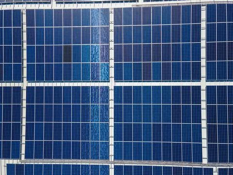 Aerial View of massive solar panel structure providing renewable energy Stock Photos