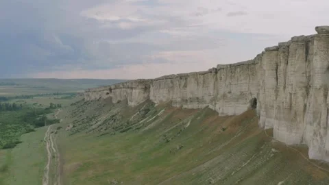 Aerial view of massive white limestone cliffs and valley Stock Footage 333836832