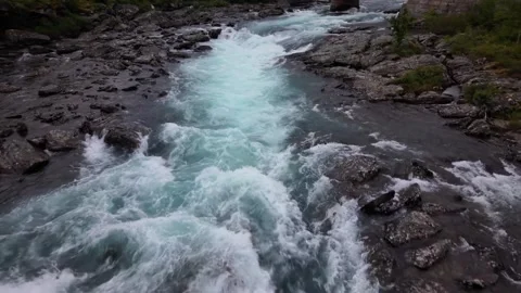 Aerial view of Maurvangsbrua bridge over river rapids, Norway. Stock Footage 340779680