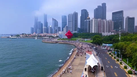 Aerial View: May Fourth Square &amp; Qingdao Coast Stock Footage 330708812