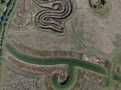 Aerial view of a maze pattern in a field in the countryside Stock Photos
