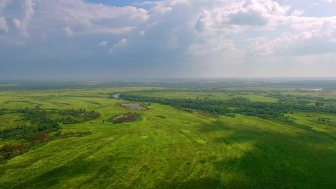 Aerial view of meadows and river 스톡 동영상 99743883