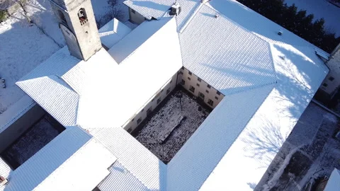 Aerial view of medieval catholic monastery of Vallombrosa snow season Vídeos de archivo 146473095
