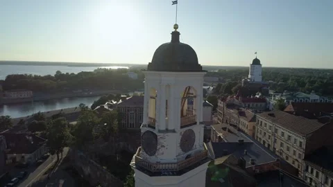 Aerial view of a medieval clock tower in heart of Vyborg old town. Panoramic Видео 171284233