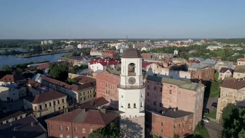 Aerial view of a medieval clock tower in heart of Vyborg old town. Panoramic Stock Footage 171285022