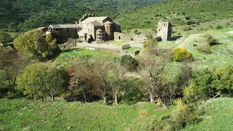 Aerial view of a medieval monastery in a mountain. Sant Quirze de Colera. Video stock 145721187