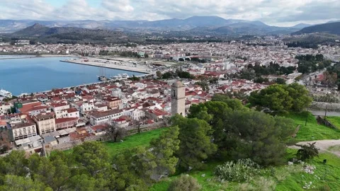 Aerial view of medieval old clock tower in Acronafplia castle old town of Nafpli Video stock 300748699