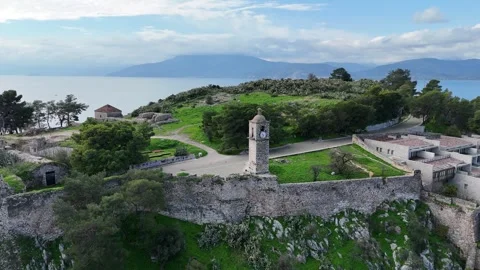 Aerial view of medieval old clock tower in Acronafplia castle old town of Nafpli Video stock 300813276