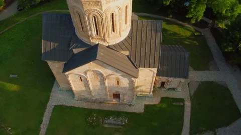 Aerial view of a medieval orthodox monastery church in a green valley 스톡 동영상 343317694