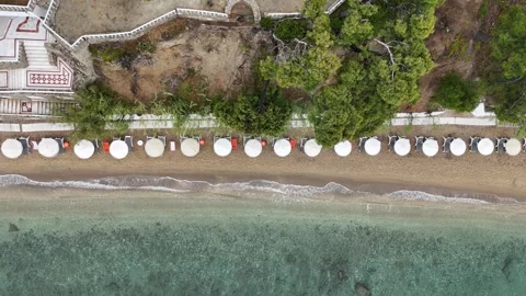 Aerial View of Mediterranean Beach with Sun Umbrellas in Halkidiki, Greece Stock Footage 327728969