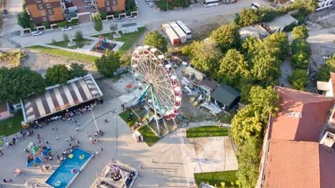 Aerial view of the medium size roller coaster at the amusement park in the city Foto stock