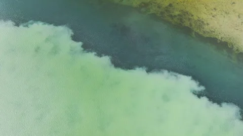 Aerial view of the meeting of two colored river waters, Iceland. Stock Footage 336320919