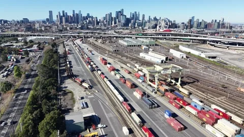 Aerial view of Melbourne freight hub with city skyline 스톡 동영상 340513561