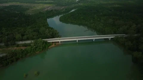 Aerial view of Mersing, Malaysia showcasing river and bridge Stock Footage 313436341