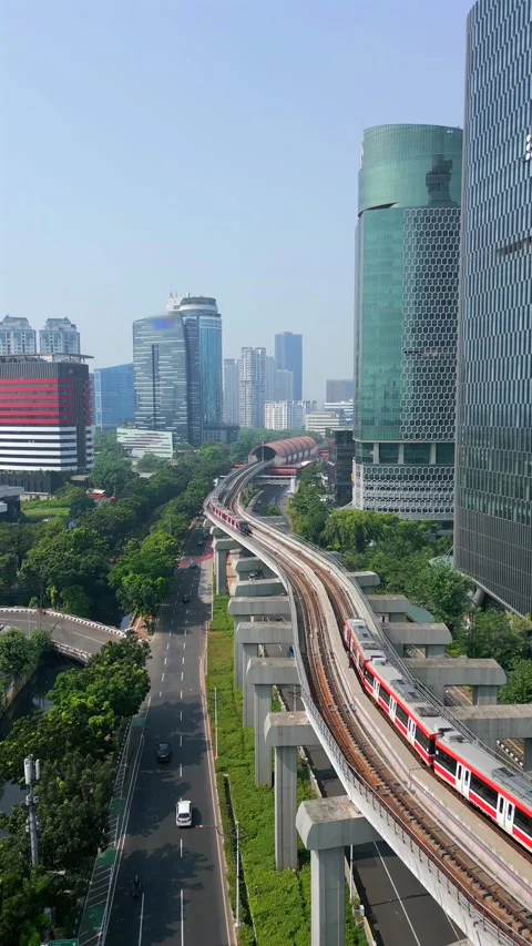 Aerial view of metro train on elevated track in Jakarta, Indonesia. Video stock 344089524