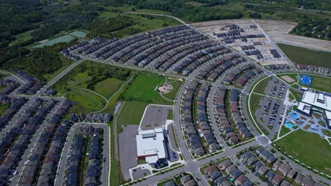 Aerial view of middle class residential houses stacked as tightly together .. Stock Footage 346728555