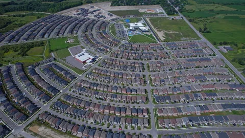 Aerial view of middle class residential houses stacked as tightly together .. Stock Footage 346728571