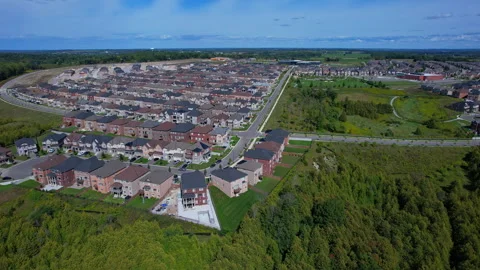 Aerial view of middle class residential houses stacked as tightly together .. Stock Footage 346728675