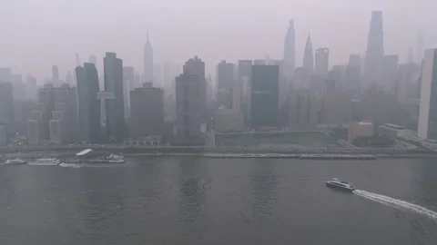 Aerial view of Midtown Manhattan under a cloud of wildfire smoke Stock Footage 341357583