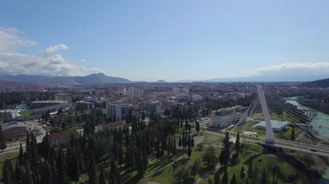 Aerial view of Millennium bridge over Moraca river, Podgorica Stock Footage 61124355