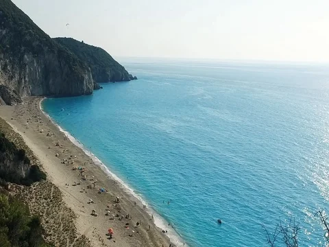 Aerial view of Milos beach and the turquoise Ionian sea in Greece. Slow motion Stock Footage 80064549