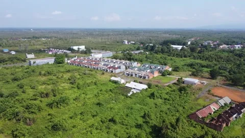 Aerial view of a minimalist housing complex with not too many houses Stock Footage 319427511