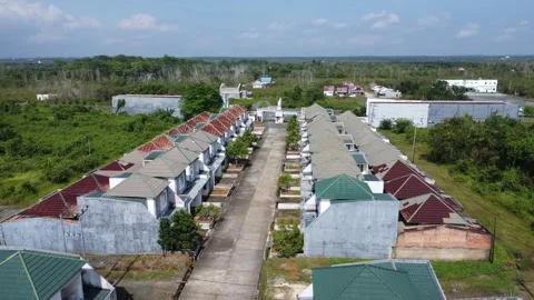 Aerial view of a minimalist housing complex with not too many houses Stock Footage 319427844