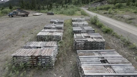 Aerial view of mining core boxes in the wilderness Stock Footage 137866154