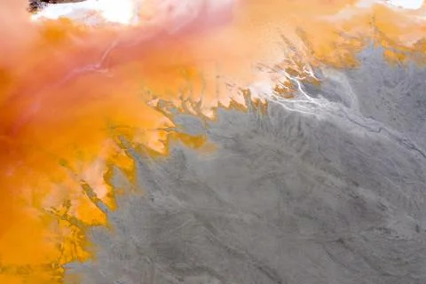 Aerial view of a mining decanting pond with toxic red residuals Stock Photos