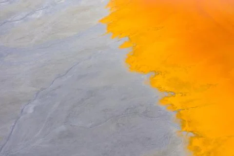 Aerial view of a mining decanting pond with toxic red residuals Foto stock