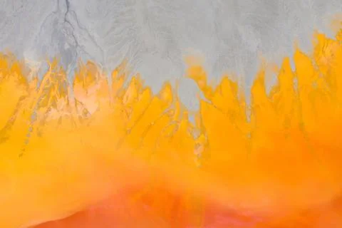 Aerial view of a mining decanting pond with toxic red residuals Foto stock