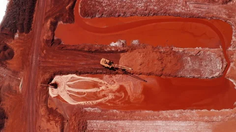Aerial view of the mining of red clay. Industrial machines work in mining. Stock Footage 172435704