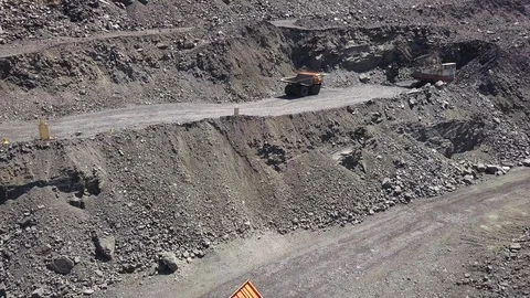 Aerial view A mining truck unloading iron ore. Stock Footage 116777010