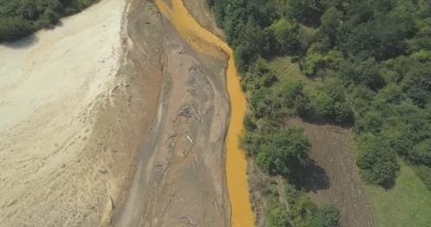 Aerial view of a mining waste disposal and the ecological damage Stock Footage 99438095