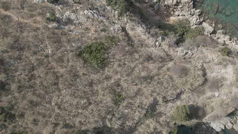 Aerial view of Mirror Beach and Pigeon Cave with cliffs, Albania Stock Footage 344854176
