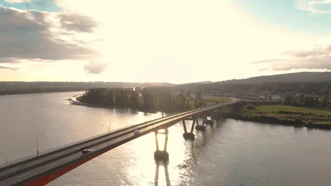 Aerial view of the Mission River bridge with cars travelling over it on a sunny Stock-Footage 108295018