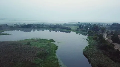 Aerial view of mist over lake Stock-Footage 117921606