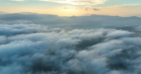 Aerial view of the mist in the sunrise sky Stock Footage 342467392