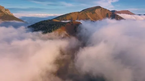 Aerial view misty clouds in alps mountains autumn nature background landscape Stock Footage 211779259